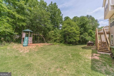 Welcome to 711 Wellington Drive, a charming home nestled in the on Monroe Golf and Country Club in Georgia - for sale on GolfHomes.com, golf home, golf lot