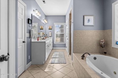 Beautifully situated in the desirable Olde Point community, this on Olde Point Golf and Country Club in North Carolina - for sale on GolfHomes.com, golf home, golf lot