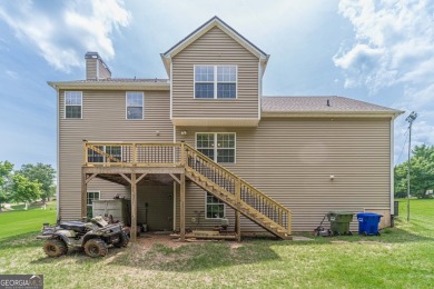 Welcome to 711 Wellington Drive, a charming home nestled in the on Monroe Golf and Country Club in Georgia - for sale on GolfHomes.com, golf home, golf lot