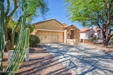 Nestled in the highly desirable Rancho Vistoso, this home is on The Golf Club at Vistoso in Arizona - for sale on GolfHomes.com, golf home, golf lot