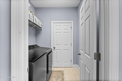 Beautifully situated in the desirable Olde Point community, this on Olde Point Golf and Country Club in North Carolina - for sale on GolfHomes.com, golf home, golf lot