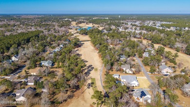 Beautifully situated in the desirable Olde Point community, this on Olde Point Golf and Country Club in North Carolina - for sale on GolfHomes.com, golf home, golf lot
