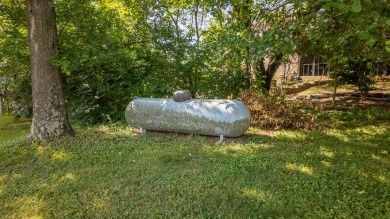 Welcome to this beautifully maintained 5-bed, 2.5-bath home on West Plains Country Club in Missouri - for sale on GolfHomes.com, golf home, golf lot