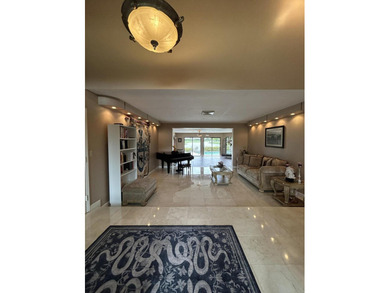 Rarely available in Lago Mar Colony Golf Community! Welcome to on Lago Mar Country Club in Florida - for sale on GolfHomes.com, golf home, golf lot