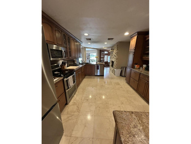 Rarely available in Lago Mar Colony Golf Community! Welcome to on Lago Mar Country Club in Florida - for sale on GolfHomes.com, golf home, golf lot