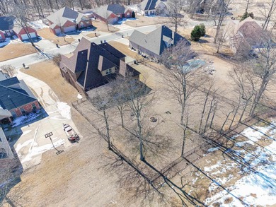 Stunning updated executive home with sunroom and screened porch on Sage Meadows Golf Course in Arkansas - for sale on GolfHomes.com, golf home, golf lot