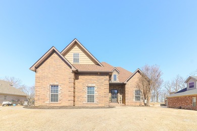 Stunning updated executive home with sunroom and screened porch on Sage Meadows Golf Course in Arkansas - for sale on GolfHomes.com, golf home, golf lot