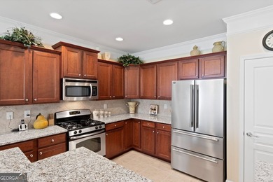 Located on prime golf lot hole #13 in the vibrant Active Adult on Canongate Golf At Sun City Peachtree in Georgia - for sale on GolfHomes.com, golf home, golf lot