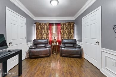 Enjoy timeless elegance and custom craftsmanship in this on Diamondhead Country Club in Mississippi - for sale on GolfHomes.com, golf home, golf lot