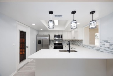 Under contract-accepting backup offers. One or more photo(s) has on Falcon Watch Golf Club in Florida - for sale on GolfHomes.com, golf home, golf lot