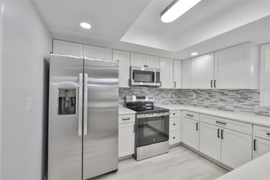 Under contract-accepting backup offers. One or more photo(s) has on Falcon Watch Golf Club in Florida - for sale on GolfHomes.com, golf home, golf lot