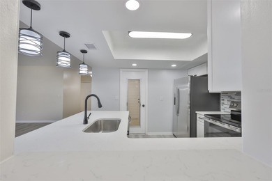 Under contract-accepting backup offers. One or more photo(s) has on Falcon Watch Golf Club in Florida - for sale on GolfHomes.com, golf home, golf lot