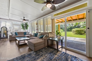 Enjoy timeless elegance and custom craftsmanship in this on Diamondhead Country Club in Mississippi - for sale on GolfHomes.com, golf home, golf lot