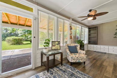 Enjoy timeless elegance and custom craftsmanship in this on Diamondhead Country Club in Mississippi - for sale on GolfHomes.com, golf home, golf lot