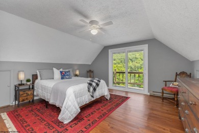 Welcome to 'Lake Reflections', a beautiful chalet nestled within on Alpine Lake Resort in West Virginia - for sale on GolfHomes.com, golf home, golf lot