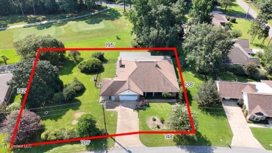 Enjoy timeless elegance and custom craftsmanship in this on Diamondhead Country Club in Mississippi - for sale on GolfHomes.com, golf home, golf lot
