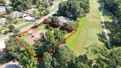 Enjoy timeless elegance and custom craftsmanship in this on Diamondhead Country Club in Mississippi - for sale on GolfHomes.com, golf home, golf lot