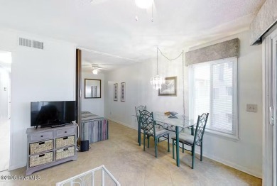 Choose your adventure in this great 2nd floor oceanfront condo on The Country Club of the Crystal Coast in North Carolina - for sale on GolfHomes.com, golf home, golf lot