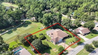 Enjoy timeless elegance and custom craftsmanship in this on Diamondhead Country Club in Mississippi - for sale on GolfHomes.com, golf home, golf lot