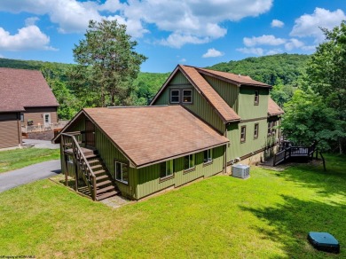 Welcome to 'Lake Reflections', a beautiful chalet nestled within on Alpine Lake Resort in West Virginia - for sale on GolfHomes.com, golf home, golf lot