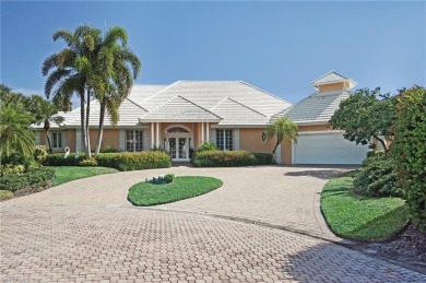 Lovely lakefront home situated in Waterford, an exclusive on Club at Pelican Bay Golf Course in Florida - for sale on GolfHomes.com, golf home, golf lot