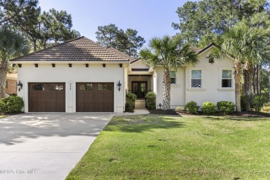 This amazing Mediterranean style home on the Egret 6th tee box on Carolina National Golf Club in North Carolina - for sale on GolfHomes.com, golf home, golf lot