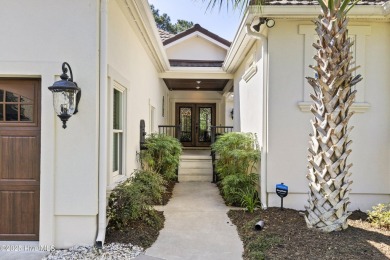 This amazing Mediterranean style home on the Egret 6th tee box on Carolina National Golf Club in North Carolina - for sale on GolfHomes.com, golf home, golf lot