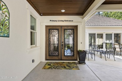 This amazing Mediterranean style home on the Egret 6th tee box on Carolina National Golf Club in North Carolina - for sale on GolfHomes.com, golf home, golf lot