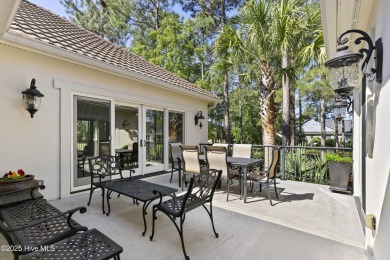 This amazing Mediterranean style home on the Egret 6th tee box on Carolina National Golf Club in North Carolina - for sale on GolfHomes.com, golf home, golf lot