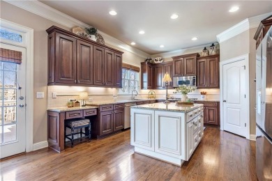 Thoughtfully expanded beyond the builder's original design with on Windermere Golf Club in Georgia - for sale on GolfHomes.com, golf home, golf lot