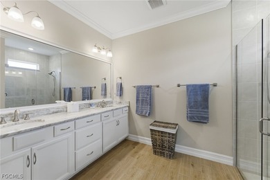 WATER & GOLF VIEWS highlight this beautifully maintained on Herons Glen Golf and Country Club in Florida - for sale on GolfHomes.com, golf home, golf lot