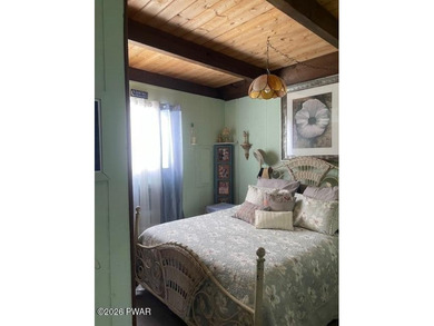 Your Forest Retreat: Enchanting Chalet in The Hideout 3 Bedrooms on The Hideout Golf in Pennsylvania - for sale on GolfHomes.com, golf home, golf lot