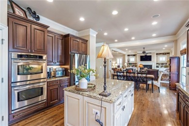 Thoughtfully expanded beyond the builder's original design with on Windermere Golf Club in Georgia - for sale on GolfHomes.com, golf home, golf lot