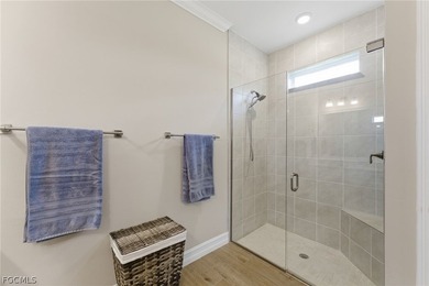 WATER & GOLF VIEWS highlight this beautifully maintained on Herons Glen Golf and Country Club in Florida - for sale on GolfHomes.com, golf home, golf lot