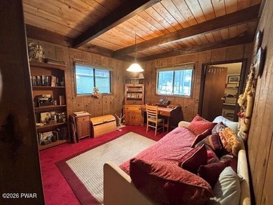 Your Forest Retreat: Enchanting Chalet in The Hideout 3 Bedrooms on The Hideout Golf in Pennsylvania - for sale on GolfHomes.com, golf home, golf lot