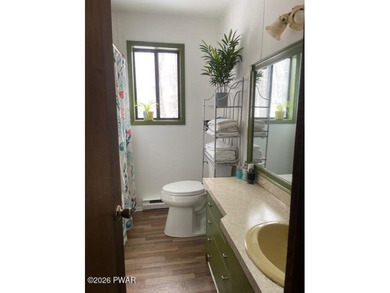 Your Forest Retreat: Enchanting Chalet in The Hideout 3 Bedrooms on The Hideout Golf in Pennsylvania - for sale on GolfHomes.com, golf home, golf lot