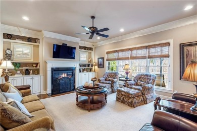 Thoughtfully expanded beyond the builder's original design with on Windermere Golf Club in Georgia - for sale on GolfHomes.com, golf home, golf lot