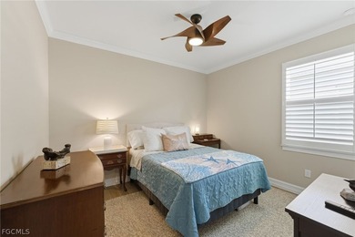 WATER & GOLF VIEWS highlight this beautifully maintained on Herons Glen Golf and Country Club in Florida - for sale on GolfHomes.com, golf home, golf lot