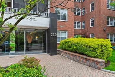 Enter through a welcoming foyer into a large living room on Leewood Golf Club in New York - for sale on GolfHomes.com, golf home, golf lot