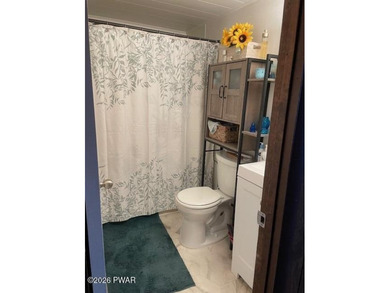 Your Forest Retreat: Enchanting Chalet in The Hideout 3 Bedrooms on The Hideout Golf in Pennsylvania - for sale on GolfHomes.com, golf home, golf lot