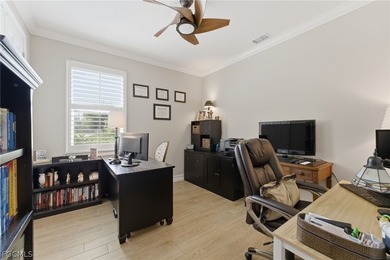 WATER & GOLF VIEWS highlight this beautifully maintained on Herons Glen Golf and Country Club in Florida - for sale on GolfHomes.com, golf home, golf lot