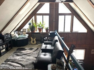 Your Forest Retreat: Enchanting Chalet in The Hideout 3 Bedrooms on The Hideout Golf in Pennsylvania - for sale on GolfHomes.com, golf home, golf lot