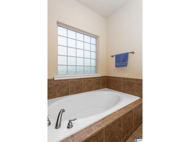 Nestled down just below the 10th tee box, in the area's premiere on Cider Ridge Golf Club in Alabama - for sale on GolfHomes.com, golf home, golf lot