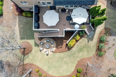 Thoughtfully expanded beyond the builder's original design with on Windermere Golf Club in Georgia - for sale on GolfHomes.com, golf home, golf lot