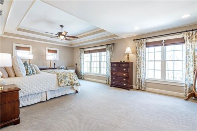 Thoughtfully expanded beyond the builder's original design with on Windermere Golf Club in Georgia - for sale on GolfHomes.com, golf home, golf lot