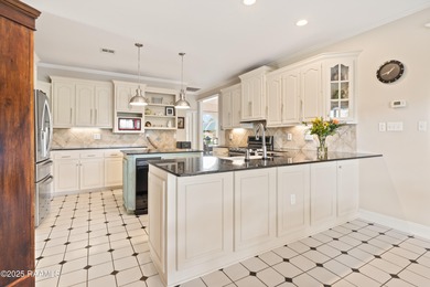 Easy to enjoy this custom built 5BR/4BA home on the lake with on LeTriomphe Golf and Country Club in Louisiana - for sale on GolfHomes.com, golf home, golf lot