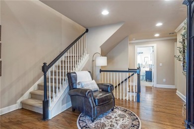 Thoughtfully expanded beyond the builder's original design with on Windermere Golf Club in Georgia - for sale on GolfHomes.com, golf home, golf lot