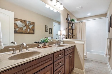 Thoughtfully expanded beyond the builder's original design with on Windermere Golf Club in Georgia - for sale on GolfHomes.com, golf home, golf lot