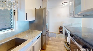 Welcome home to this beautifully renovated 2024 corner unit on on Pearl Country Club in Hawaii - for sale on GolfHomes.com, golf home, golf lot