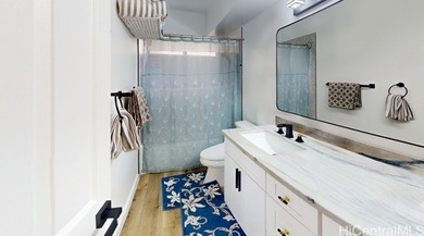 Welcome home to this beautifully renovated 2024 corner unit on on Pearl Country Club in Hawaii - for sale on GolfHomes.com, golf home, golf lot